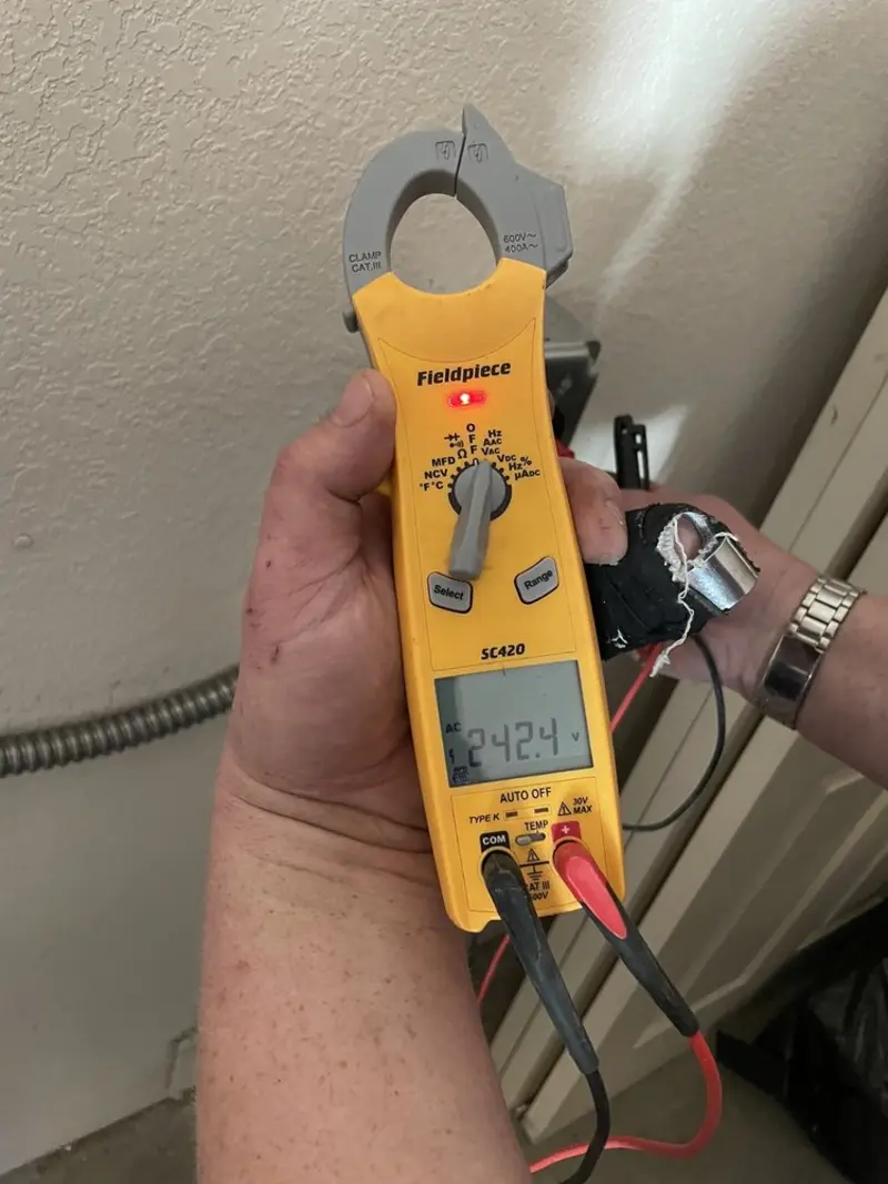 Voltage testing with clamp meter during Hot Tub / Pool Electrical Wiring in Cleveland